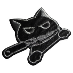 Нашивка "Кот с ножом" | Черная | Нашивка в форме головы разъяренного кота, держащего в зубах нож.