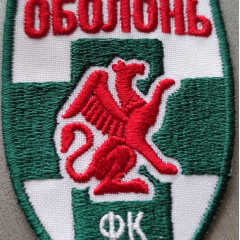 Нашивка "Оболонь Киев" | Щит с красным грифоном, с надписью «ОБОЛОНЬ ФК Киев». |