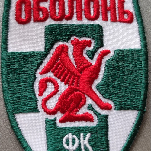 Нашивка "Оболонь Киев" | Щит с красным грифоном, с надписью «ОБОЛОНЬ ФК Киев». |